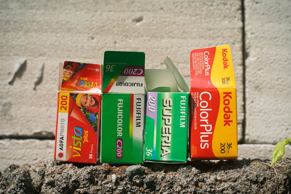 a group of toothpaste sitting on top of a rock