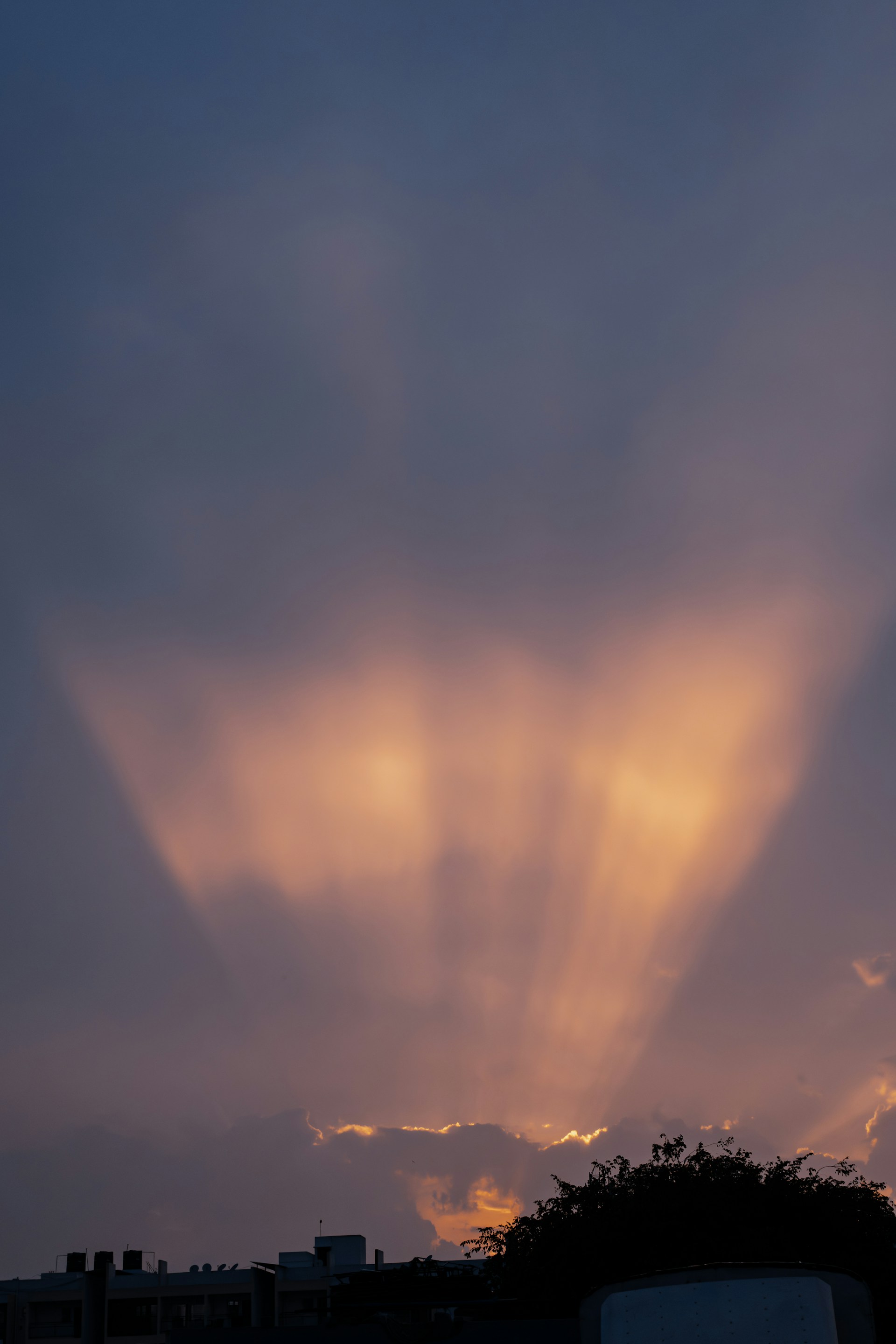 the sun is shining through the clouds in the sky