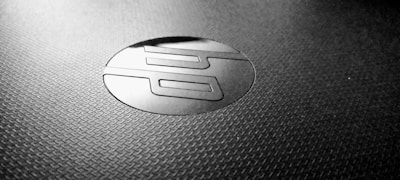 Close-up of a sleek digital logo design featuring the letters 'khob' in bold, modern typography.