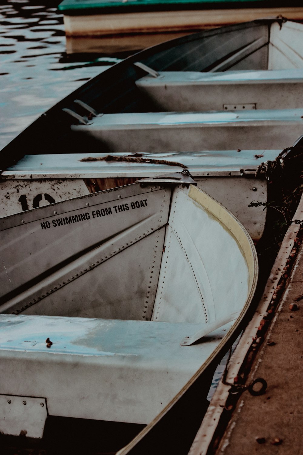 a couple of boats that are sitting in the water