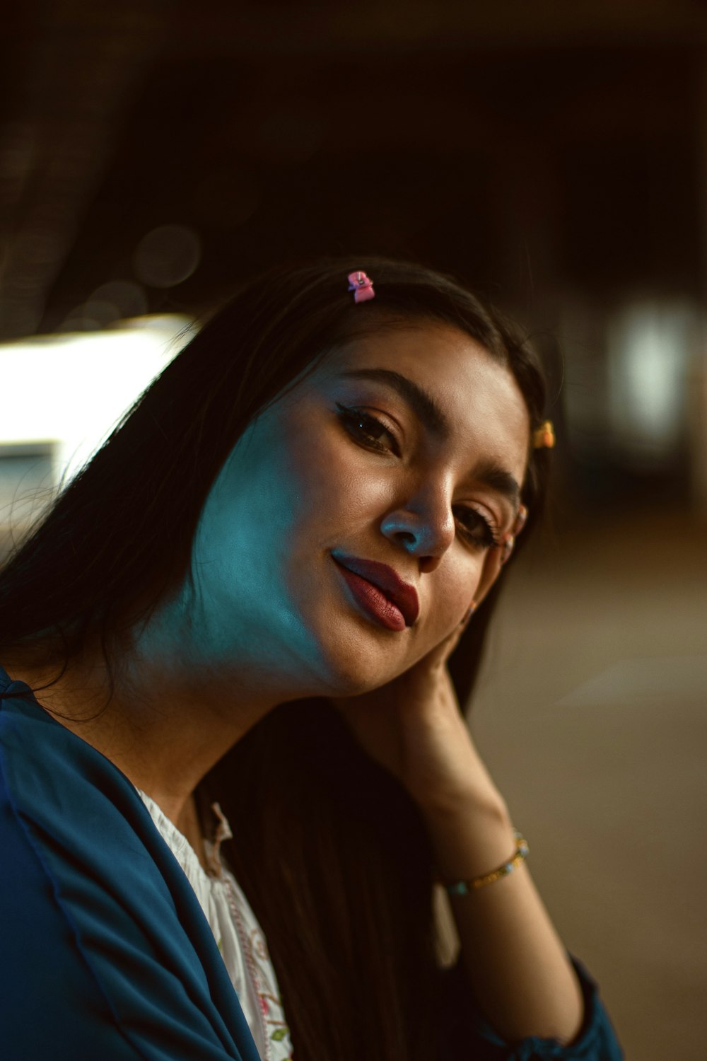 a woman with a flower in her hair