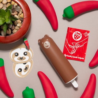 Colorful collection of parenting products offered by Hawtsauce Life.