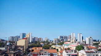 a view of a city with tall buildings
