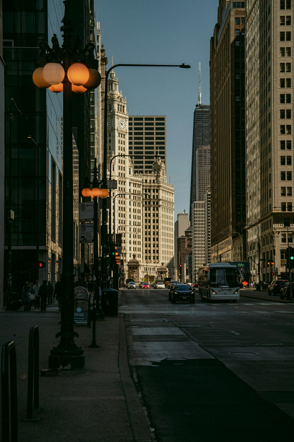 a city street filled with lots of tall buildings