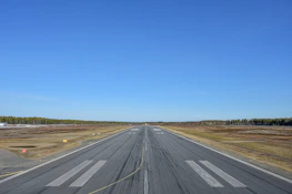A virtual runway stretching out under clear blue skies in Aviara.
