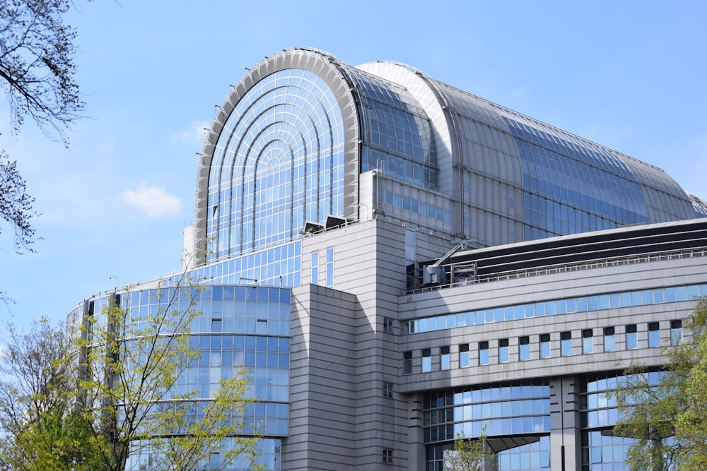 a large building with a train on top of it