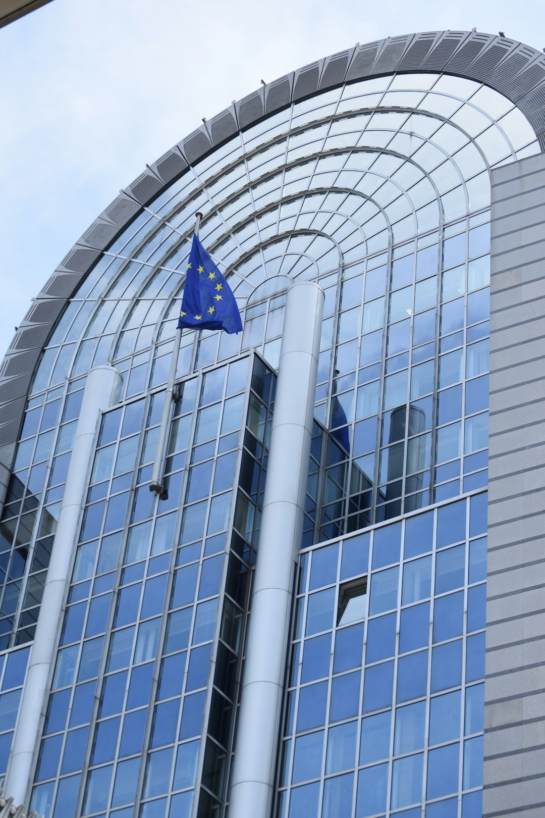 a building with a blue flag on top of it