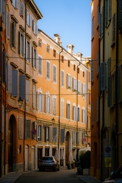 a car is parked on the side of a street