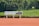 A modern tennis court equipped with advanced technology and analytics tools.