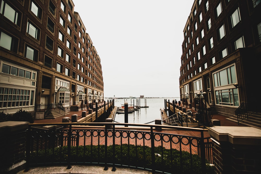 a couple of buildings that are next to a body of water