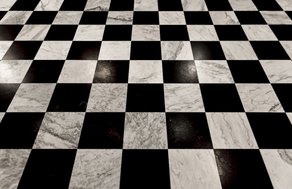 a black and white checkered floor with a black and white checkerboard pattern