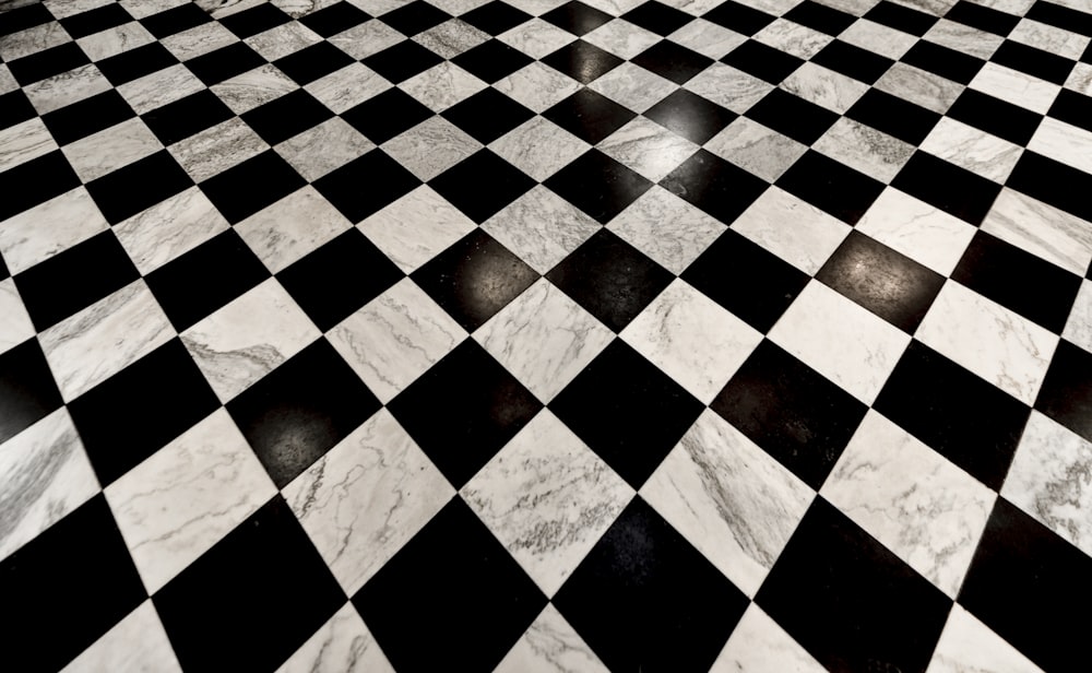 a black and white floor with a checkered pattern