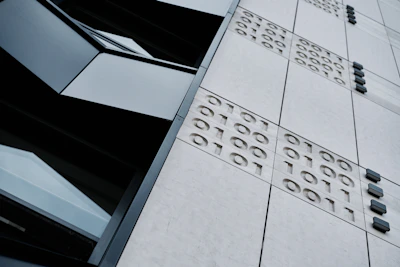 Close-up of a 3D sensor device installed in a modern corporate building.