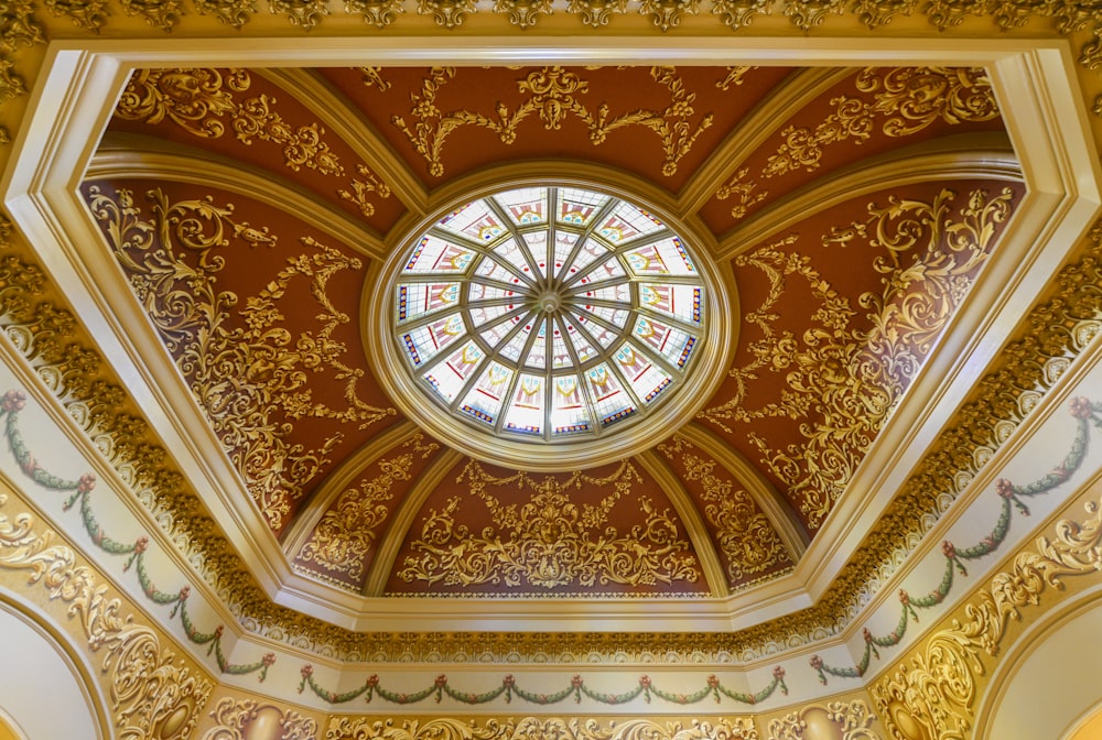 a ceiling with a circular glass window in it