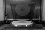 A vintage vinyl record spinning on a turntable.