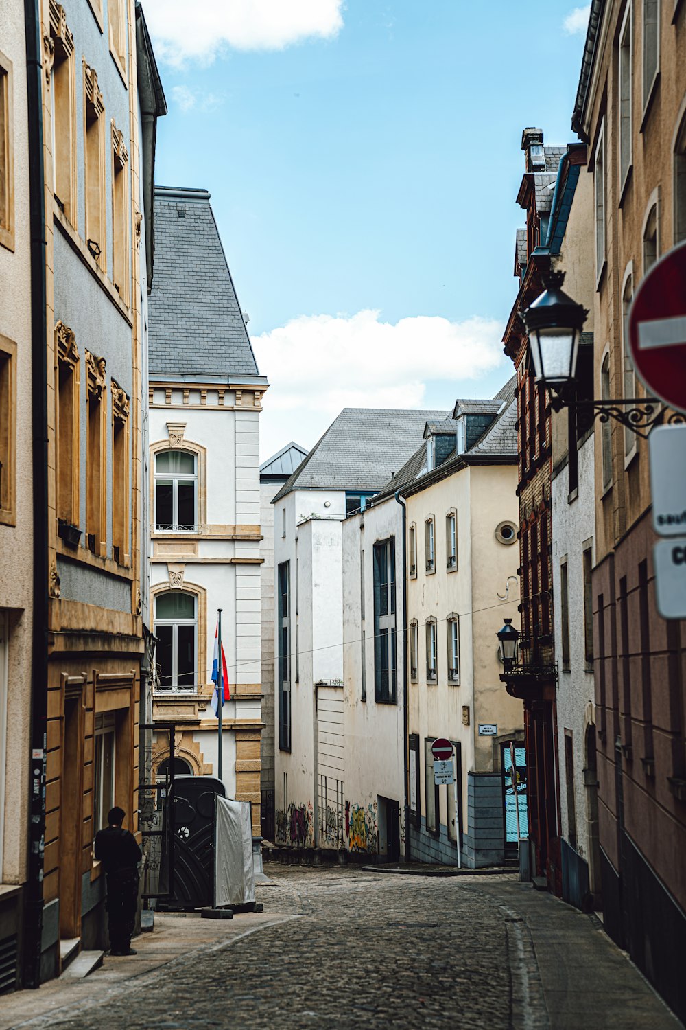 a cobblestone street in a european city