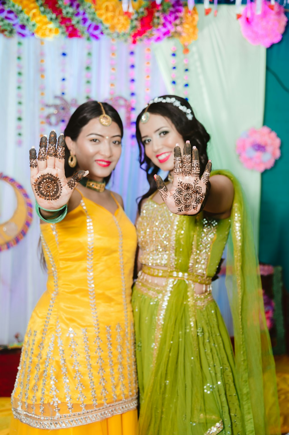 a couple of women standing next to each other