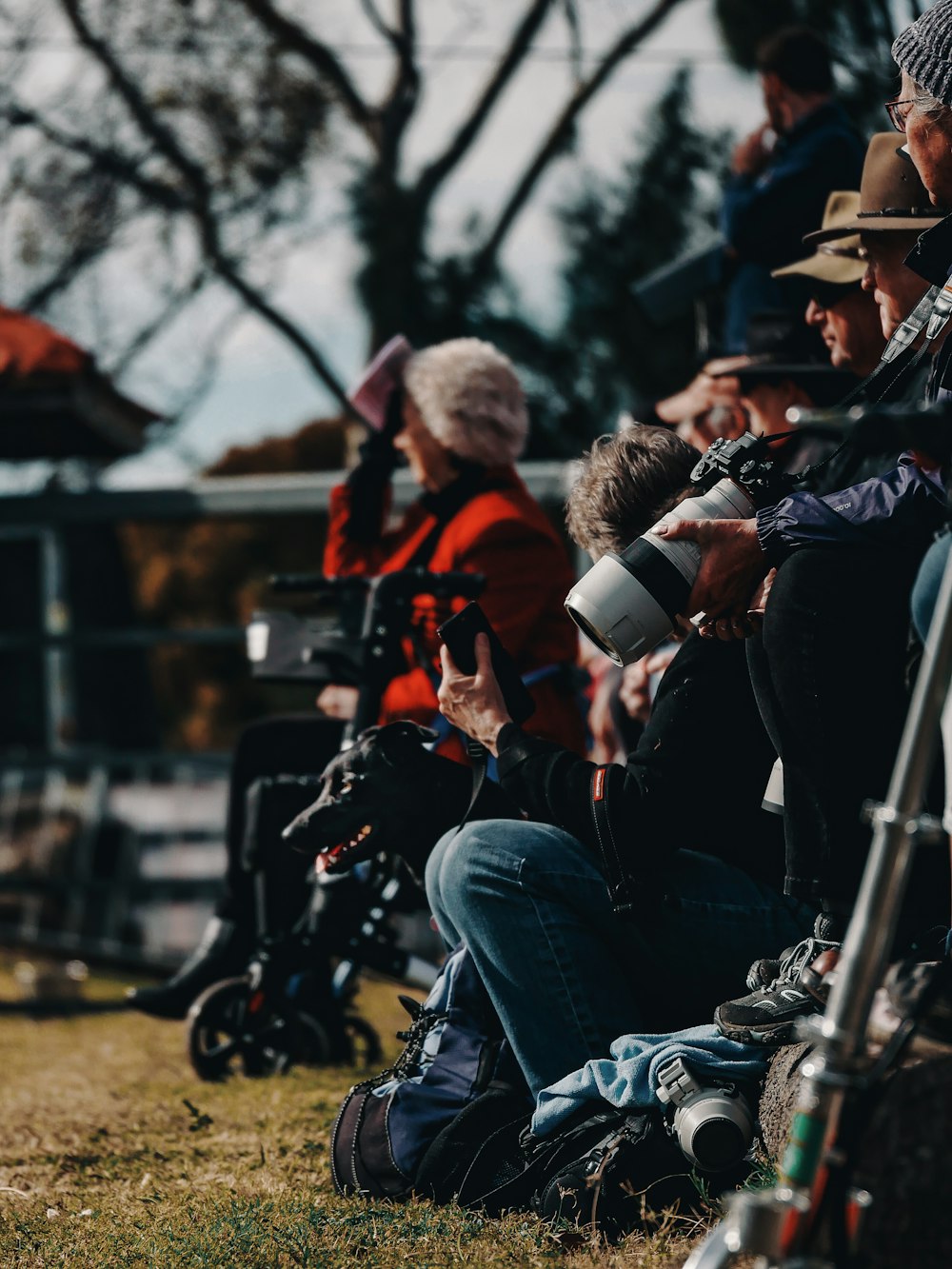 a group of people sitting next to each other