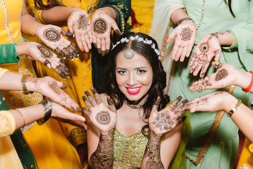 Vibrant mehndi event with colorful décor and joyful guests celebrating at MD Palace.