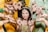 A vibrant image of a festive celebration featuring henna designs on hands.