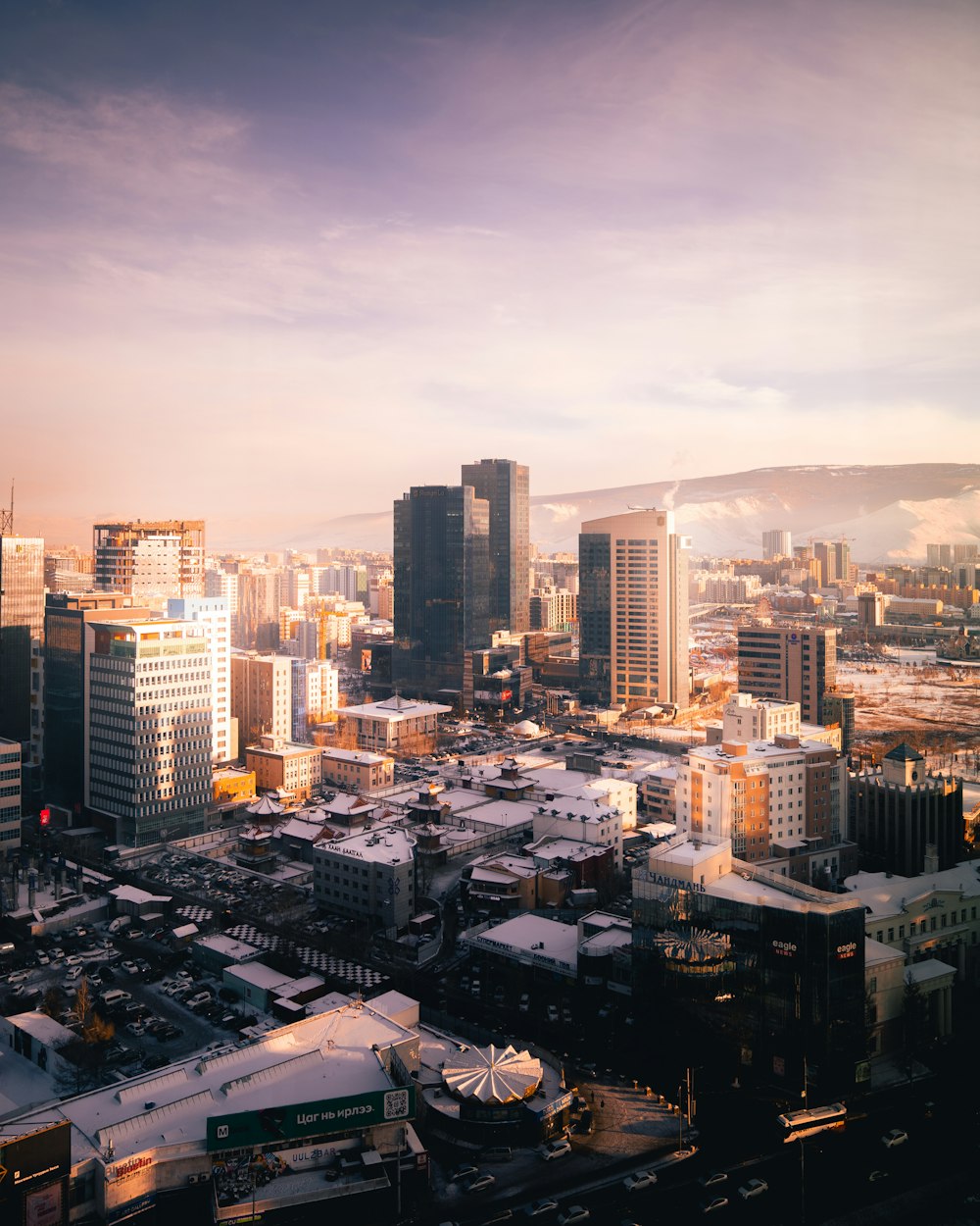 a view of a city with tall buildings