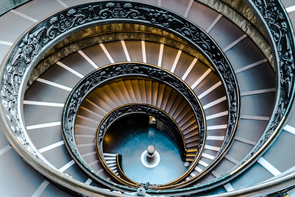 a close up of a spiral staircase in a building