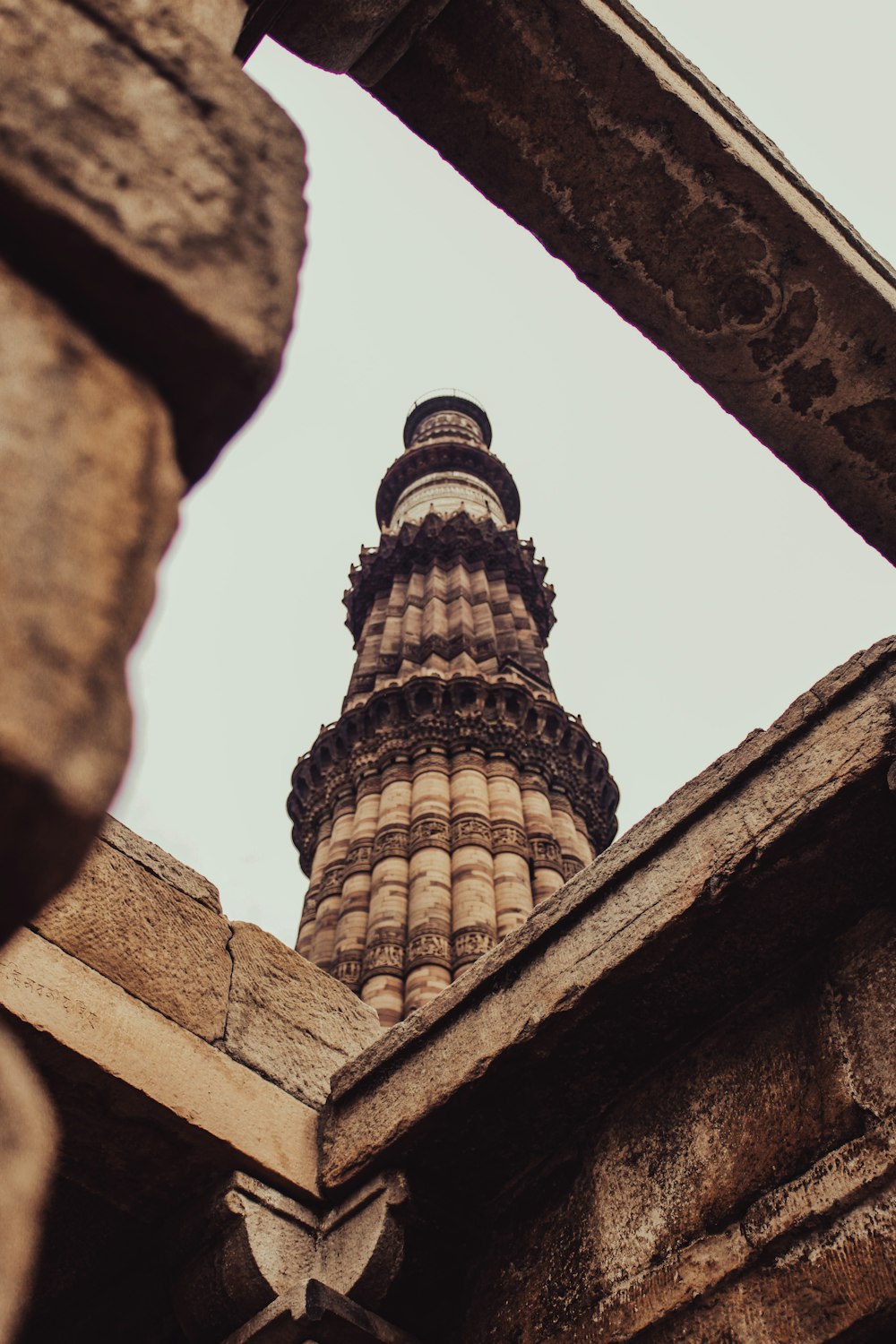 a very tall tower towering over a city