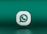 A three-dimensional icon resembling the logo of a chat application, featuring a white speech bubble with a green telephone handle inside. The icon is set against a gradient green background and appears to be floating.