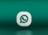 A three-dimensional icon resembling the logo of a chat application, featuring a white speech bubble with a green telephone handle inside. The icon is set against a gradient green background and appears to be floating.