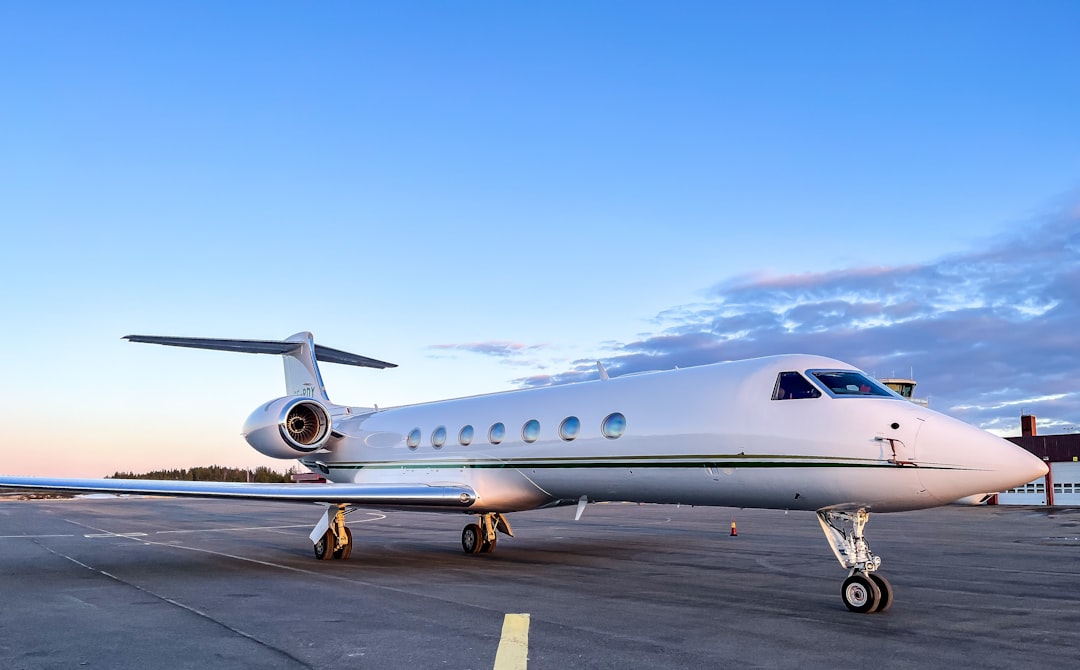 A luxury private jet on a remote airstrip.