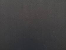 a close up of a cell phone with a black background