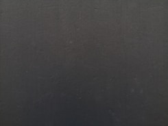 a close up of a cell phone with a black background