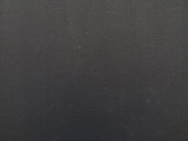 a close up of a cell phone with a black background