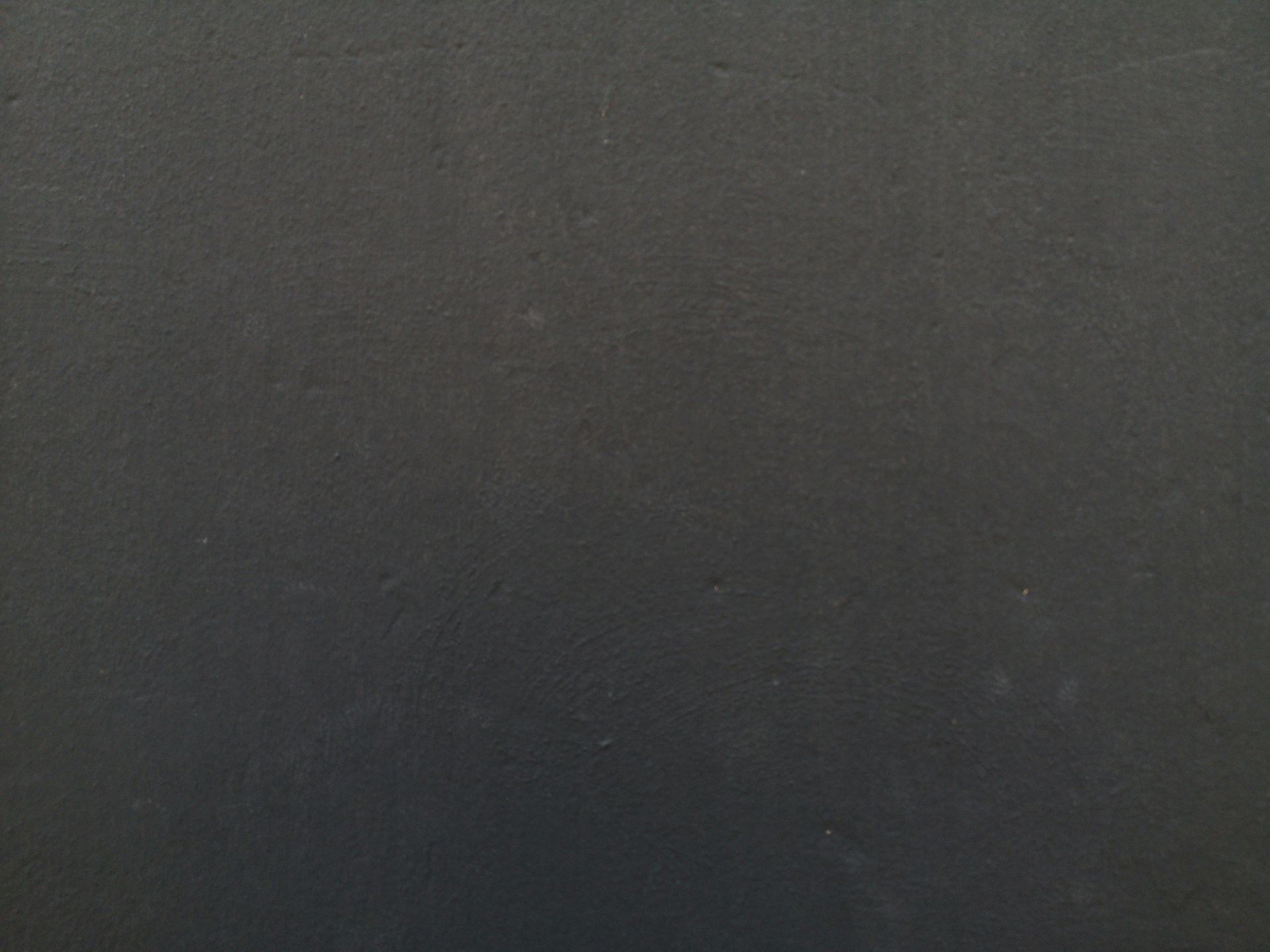 a close up of a cell phone with a black background