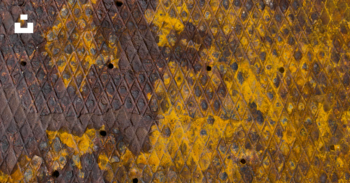 Yellow Rusted Surface Texture A rusted metal surface with yellow paint photo – Free Macro Image on ...