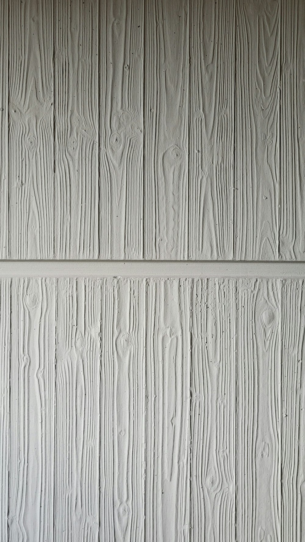 a close up of a wall made of wood planks