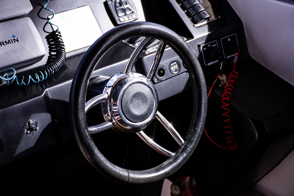 a steering wheel and dashboard of a car