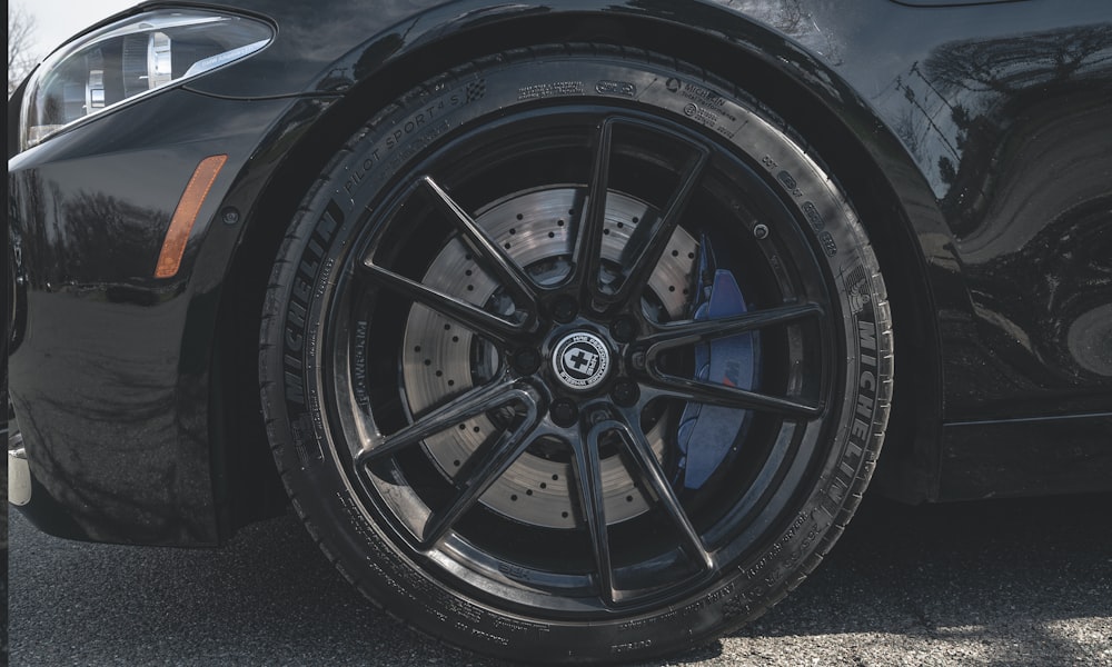 a close up of a tire on a car