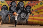 A joyful scene featuring kids enjoying colorful art.