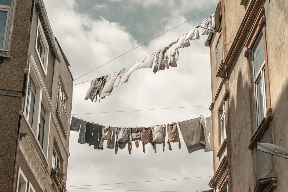 a row of clothes hanging from a clothes line