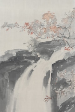 A serene traditional painting features a waterfall flowing over dark rocks, surrounded by delicate branches with light pink and orange foliage. The subtle use of colors creates a gentle and calming atmosphere.