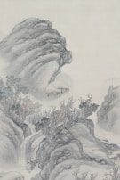 A traditional Asian landscape painting featuring towering, misty mountains and intricate foliage. A small pagoda-like structure is nestled among the trees near the base of the mountains, with a waterfall cascading down from the rocks above.