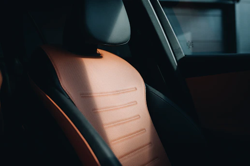 a close up of a car's interior with the sunroof