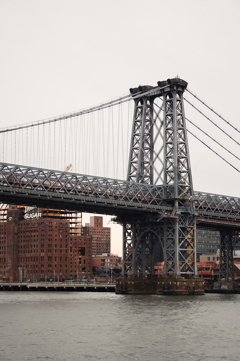 a large bridge spanning over a large body of water