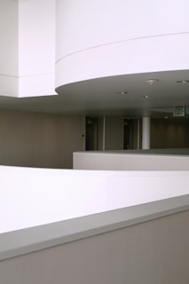 Elegant hallway with minimalist lighting highlighting textured walls