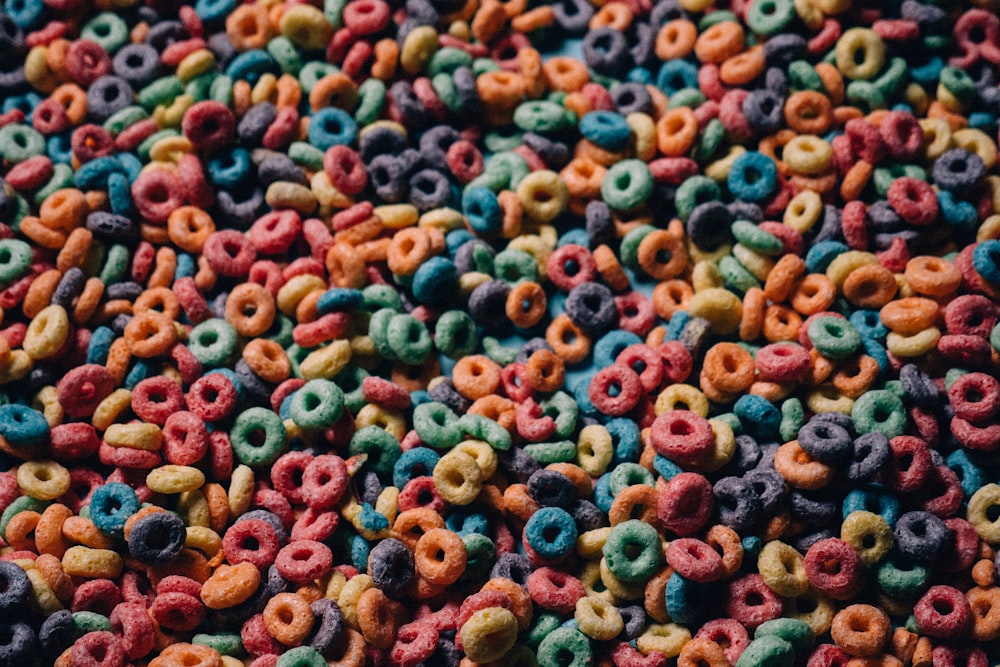 a large amount of colorful cereals and cereal rings