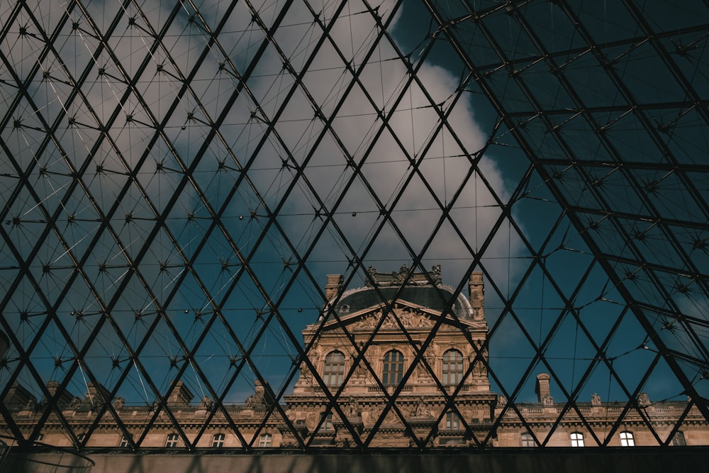 a view of a building through a glass window