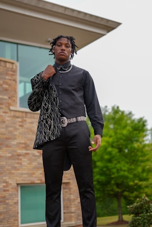 A lifestyle shot showing a person confidently wearing xmjqmy custom clothing outdoors.