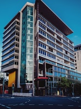 Modern office building exterior of Soltra Trading L.L.C. in Dubai's Alkhubaisi district.
