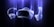 A futuristic virtual reality headset with two handheld controllers is featured against a dark background with a glowing blue aura surrounding them. The design is sleek and modern, emphasizing advanced technology.